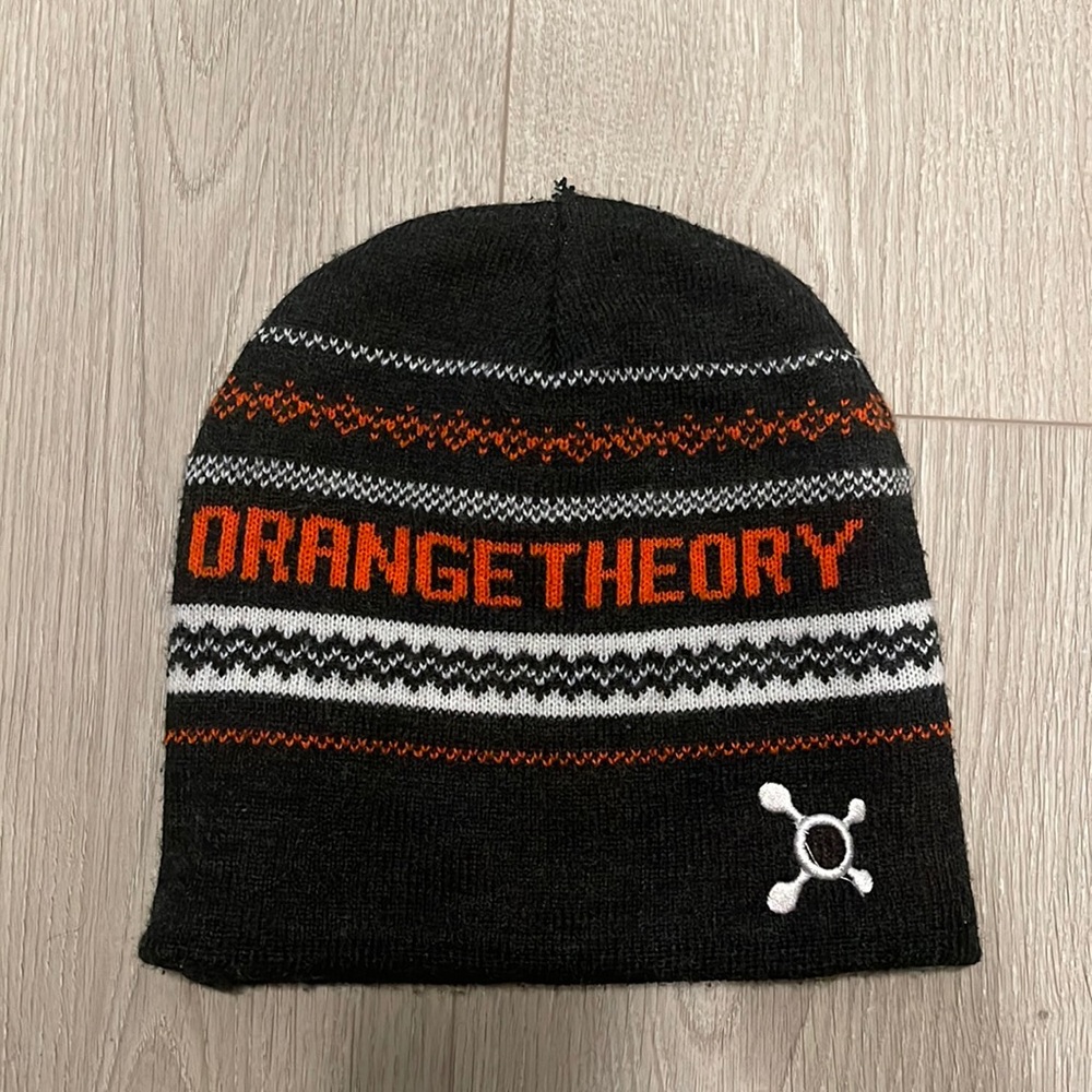 Orange theory fitness beanie and towel.